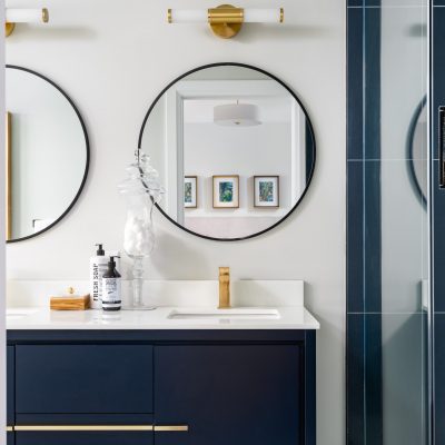 Blue vanity with mirrors